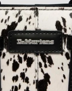 Bolso mini de piel&nbsp;Hair On&nbsp;con estampado dálmata in Crema & Negro