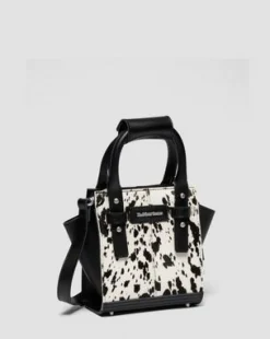 Bolso mini de piel&nbsp;Hair On&nbsp;con estampado dálmata in Crema & Negro
