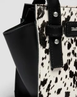 Bolso mini de piel&nbsp;Hair On&nbsp;con estampado dálmata in Crema & Negro