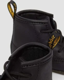 Botas 1460 de piel Auburn para recién nacidos in Negro