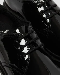 Zapatos 1461 para joven en charol in Negro